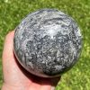 large, brecciated jasper sphere