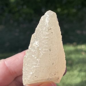 a natural dog tooth calcite point