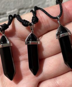 black double terminated pendants on cord