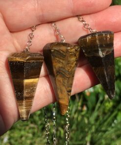 faceted tiger's eye pendulums