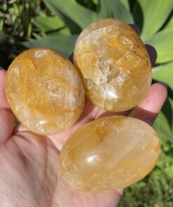 Madagascan golden quartz palm stones