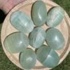 Green Calcite Palm Stones from Pakistan