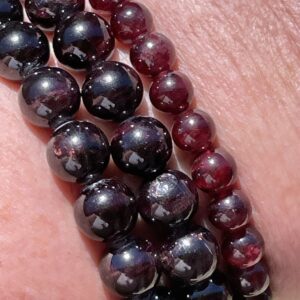 garnet bracelets in round bead form