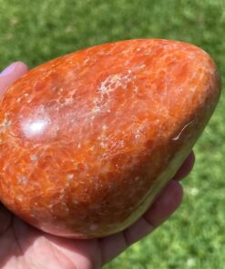 large orange calcite polished crystal