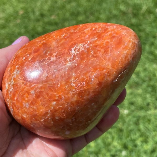 large orange calcite polished crystal