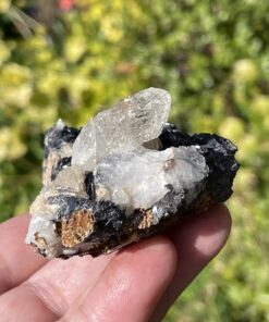 hematite on clear quartz cluster from China