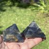 polished iolite pyramids from India