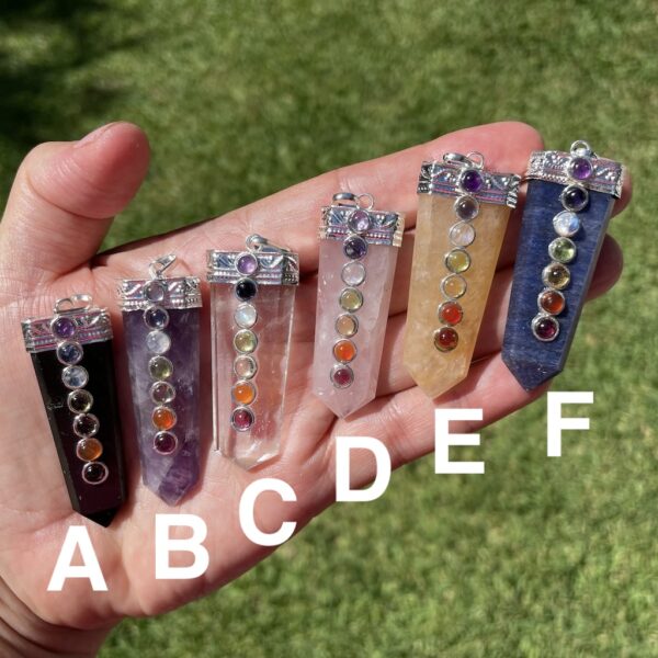 chakra pendants as amethyst and clear quartz from India