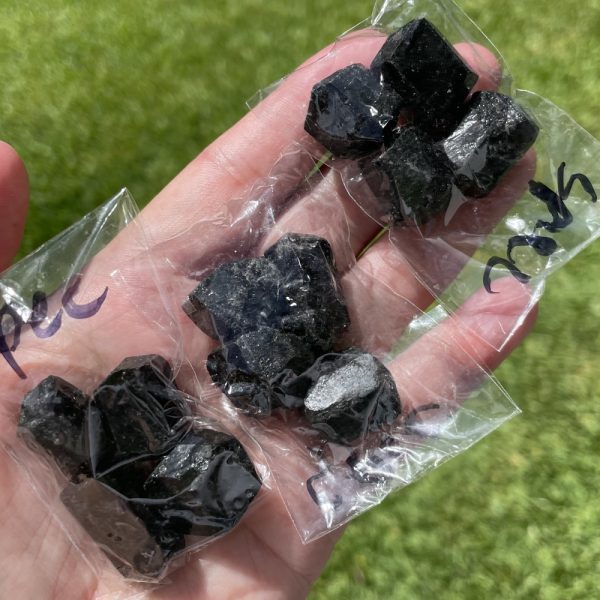 bag of small specimens of black tourmaline