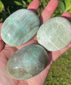 green moonstone palm stones