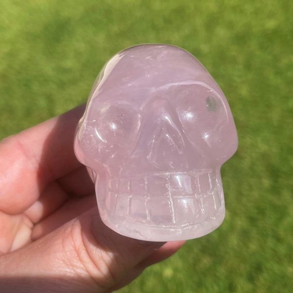a quirky crystal skull in rose quartz