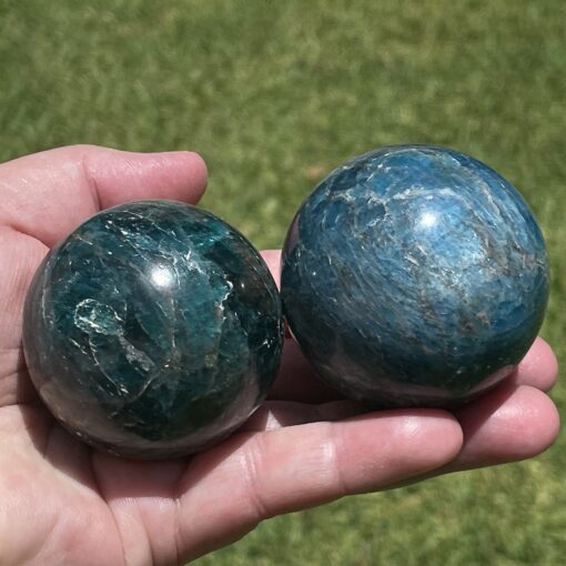 blue apatite polished specimen and green apatite polished crystal