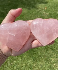 quality rose quartz polished crystal in the shape of a puff heart