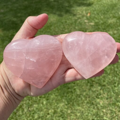 quality rose quartz polished crystal in the shape of a puff heart