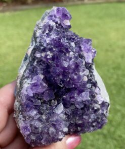 amethyst cluster with calcite crystals