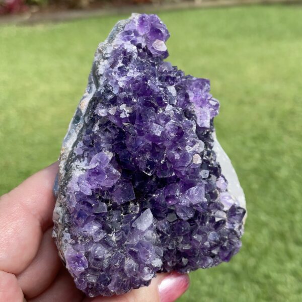 amethyst cluster with calcite crystals