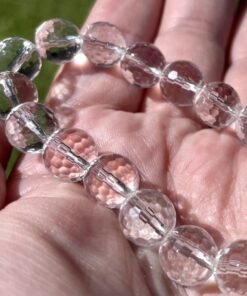 a clear quartz bracelet with faceted beads